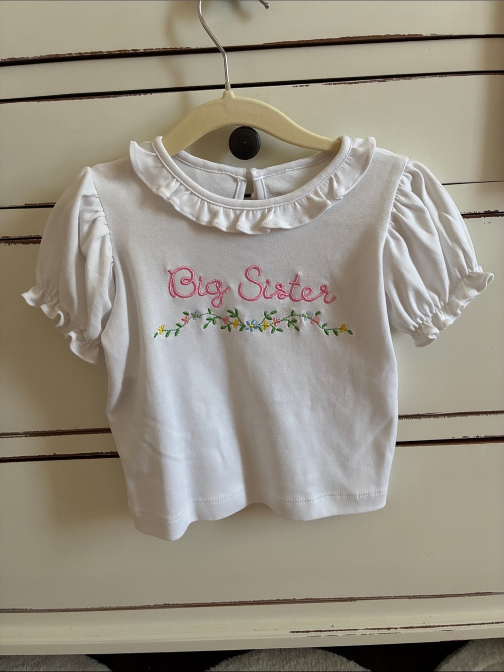 Remember Nguyen 'Big Sister' Embroidered Ruffle Neck Top